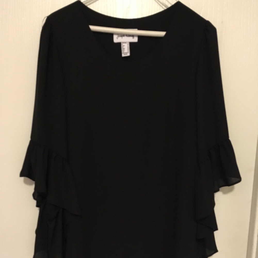 Beautiful black blouse dress up or down